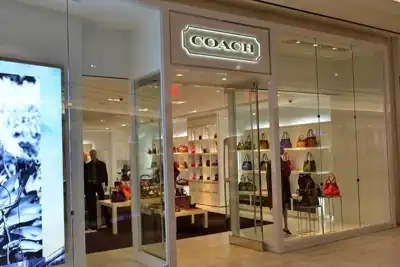 Coach steps back into shoes