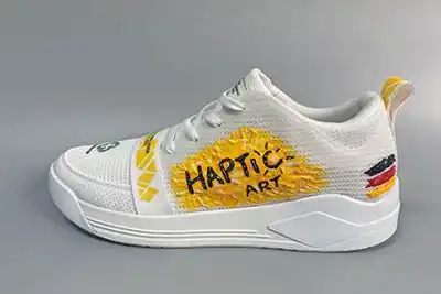 HAPTIC textile coating for footwear