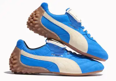 Blue suede shoes: Rihanna does football