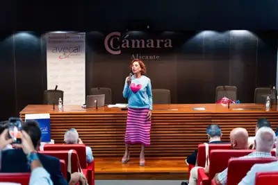 Designer makes surprise appearance at footwear meeting